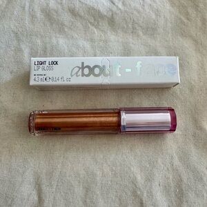 about-face Light Lock Lip Gloss - Shimmery Bronze
